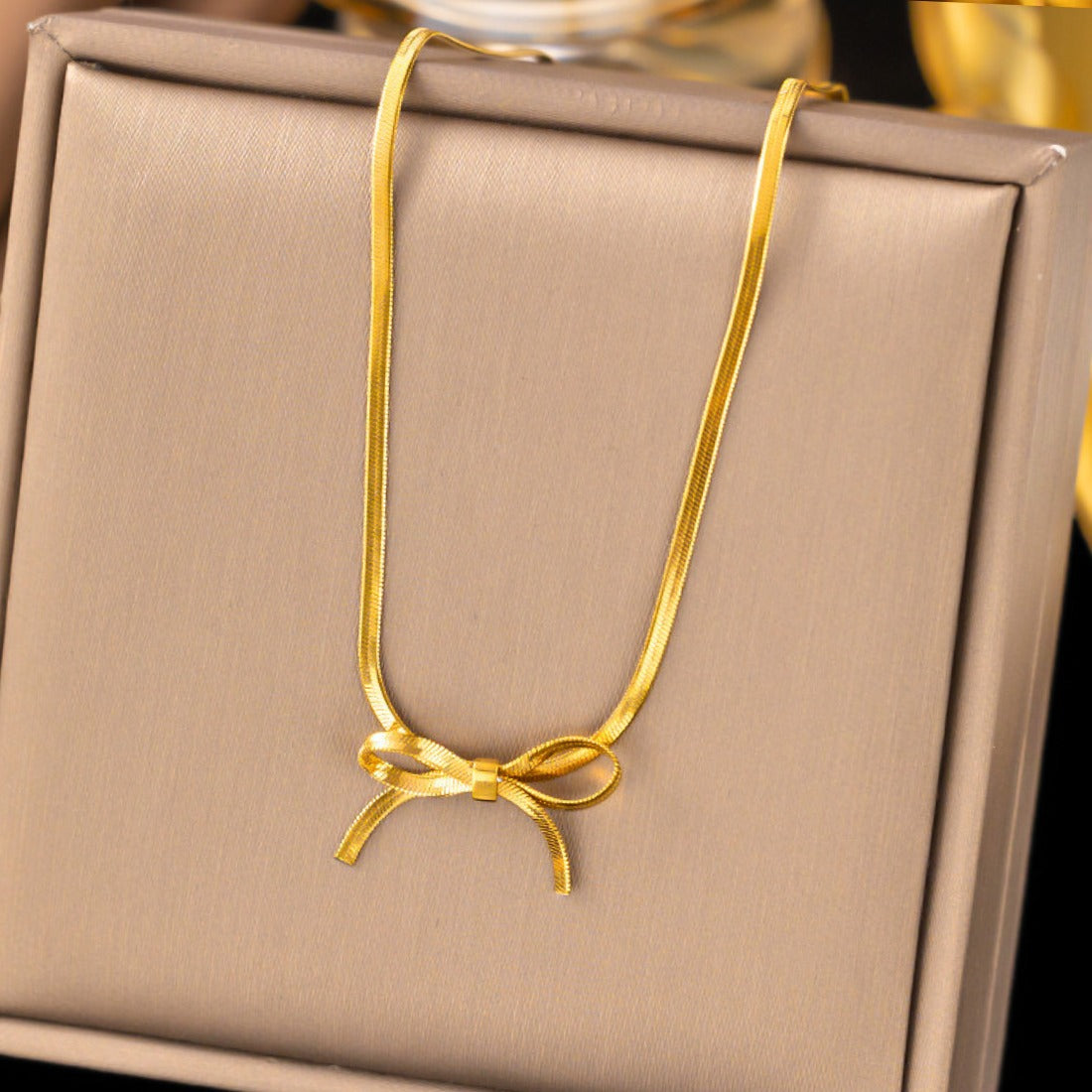 FS-NCKS4C41 - Bow Knot Snake Chain Necklace