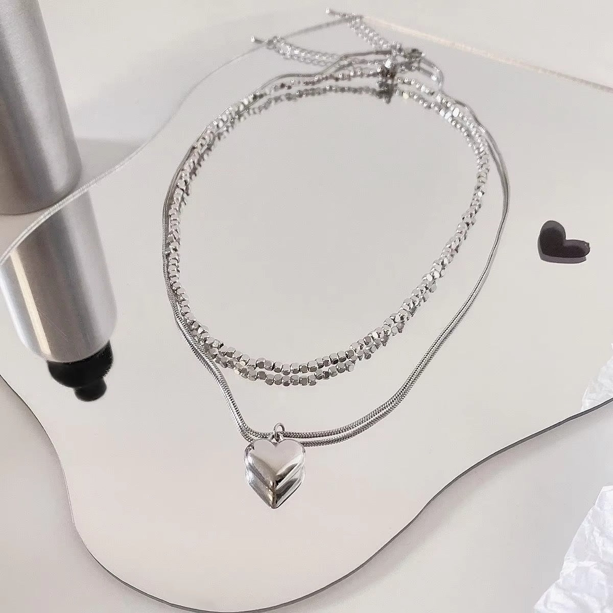 FS-NCKS4C64 - Double Layer Silver Geometric Beads & Heart Drop Necklace