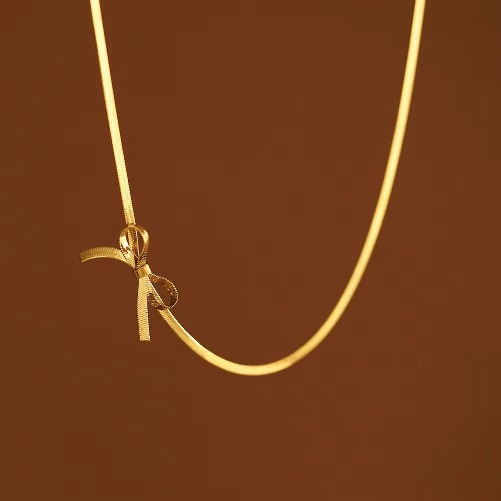 FS-NCKS4C41 - Bow Knot Snake Chain Necklace